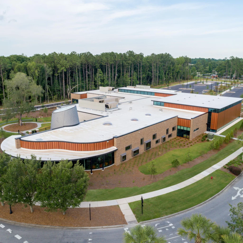 Wando Library's façade featuring Longboard Tongue & Groove siding planks.